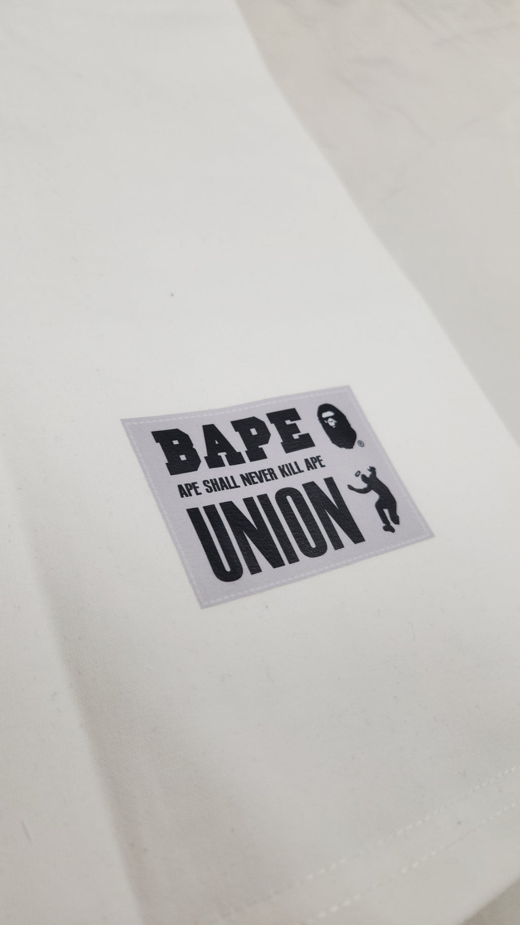 A BATHING APE X UNION PIGMENT DYED APE HEAD TEE