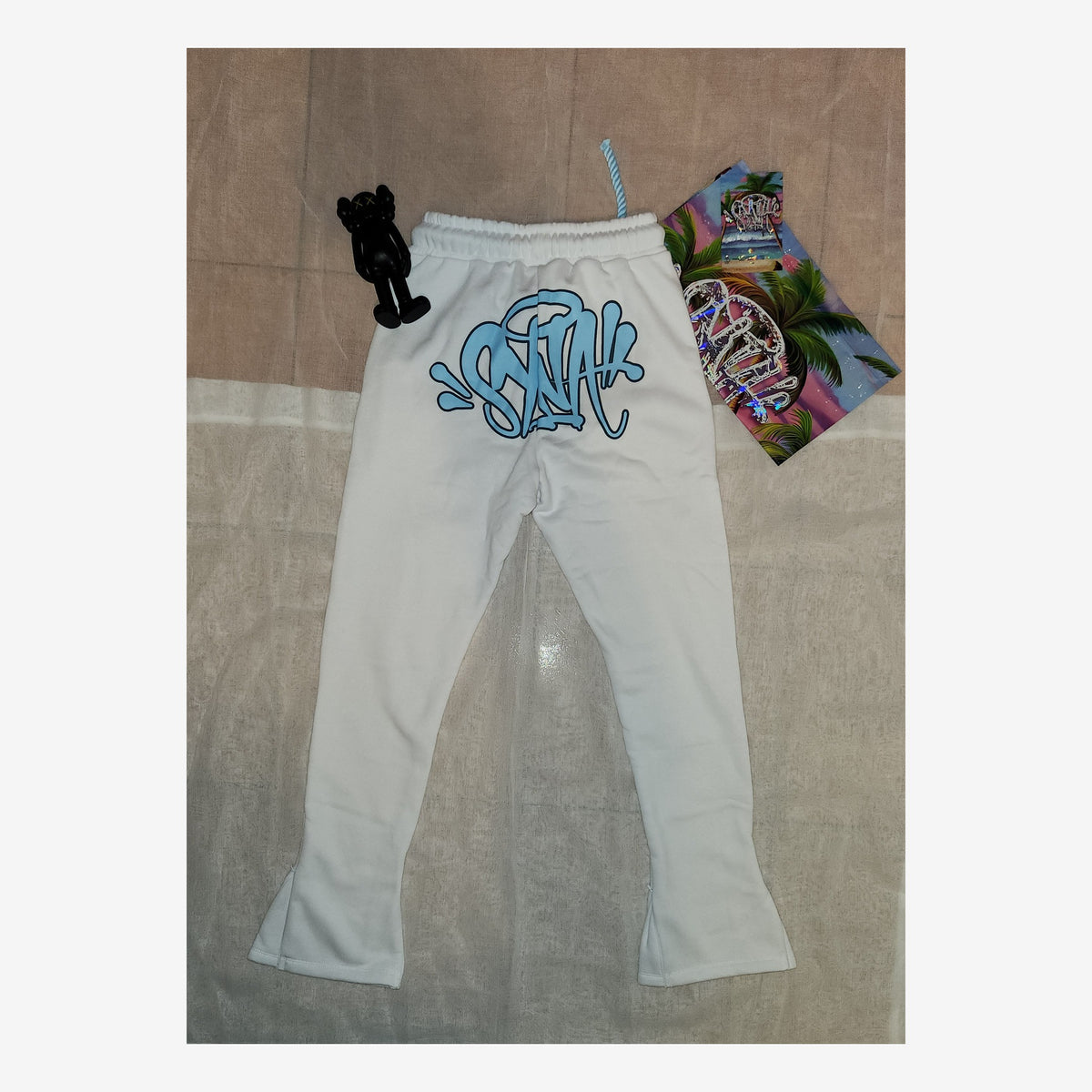 SNWRLD WHITE TRACKPANTS